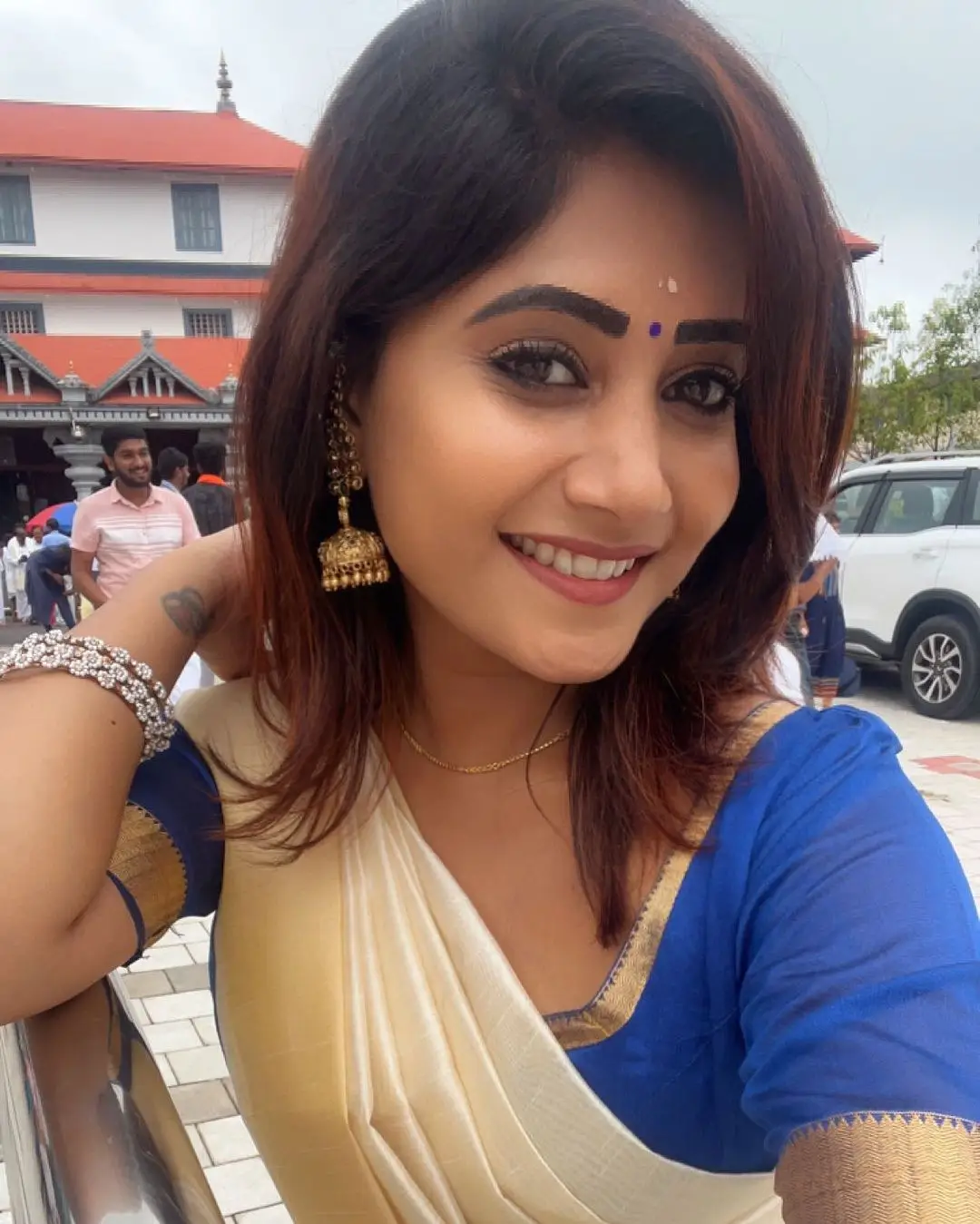 Vasanthi Krishnan Wearing Traditional White Saree Blue Blouse